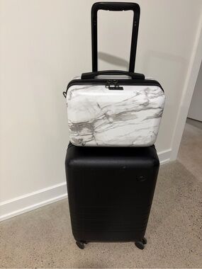 Calpak Hard marble cosmetics travel case